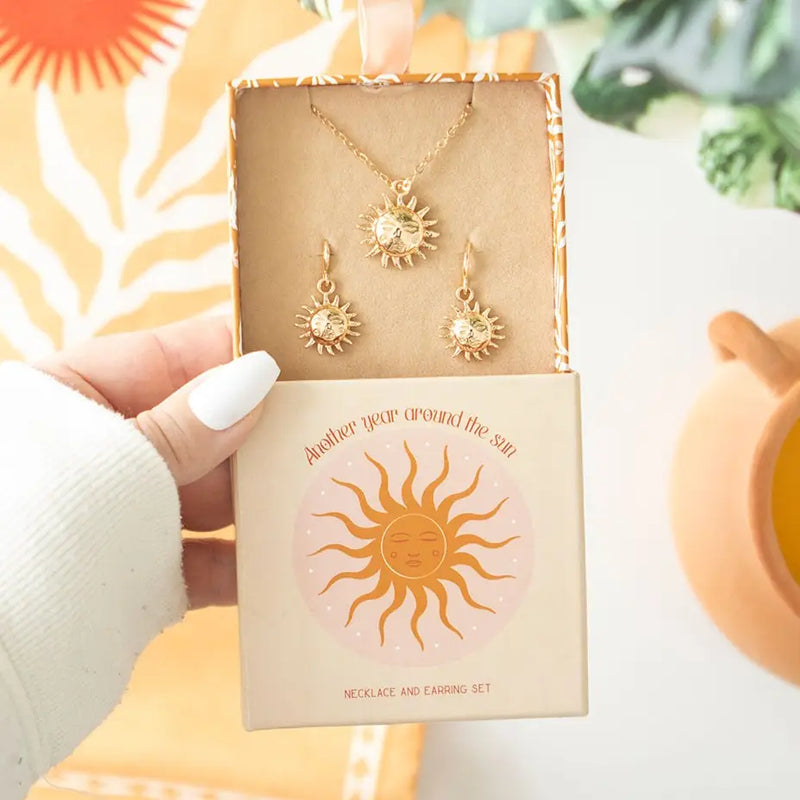 Boucle d’oreille et chaîne | Soleil